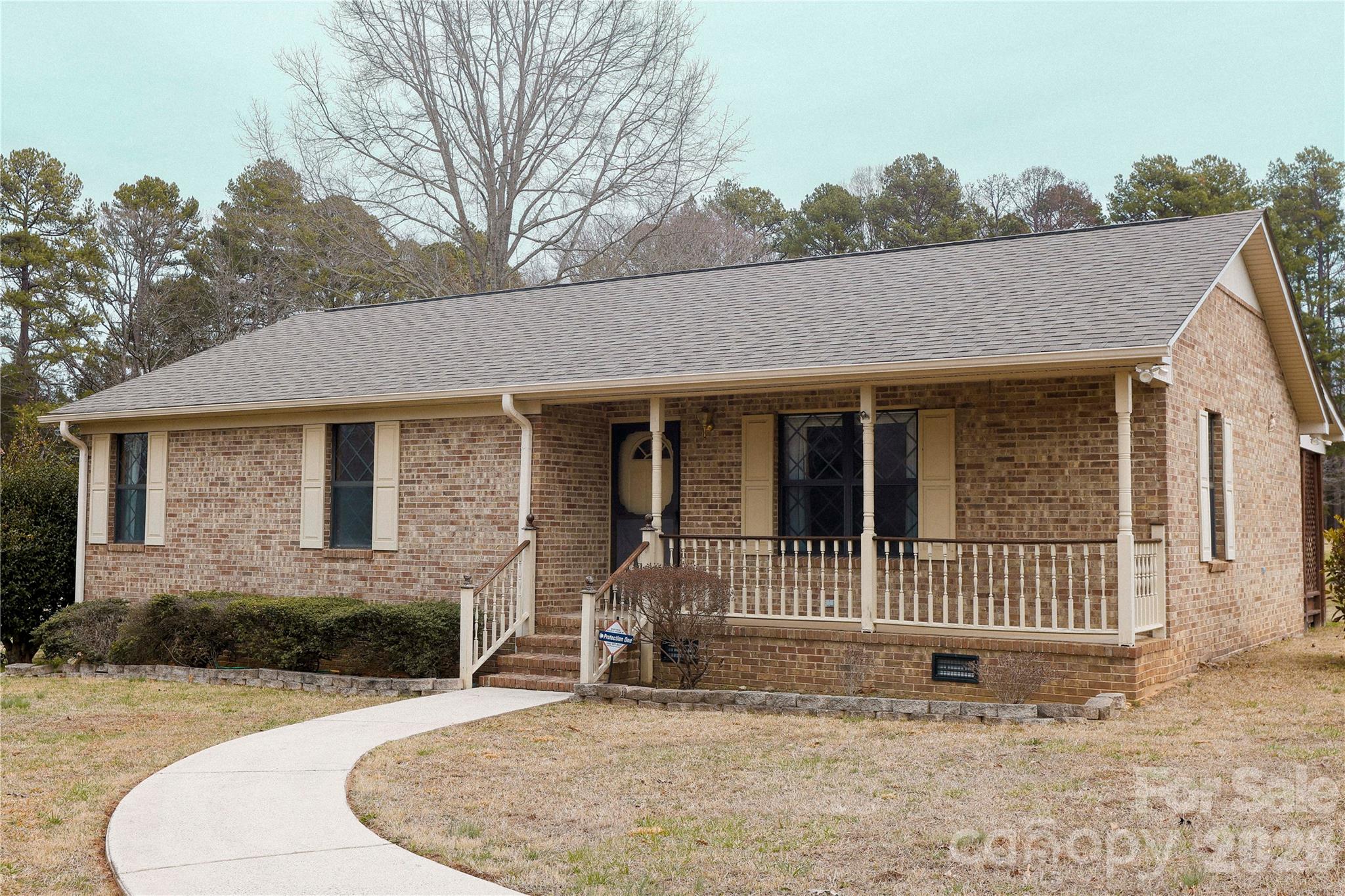 a front view of a house with a porch