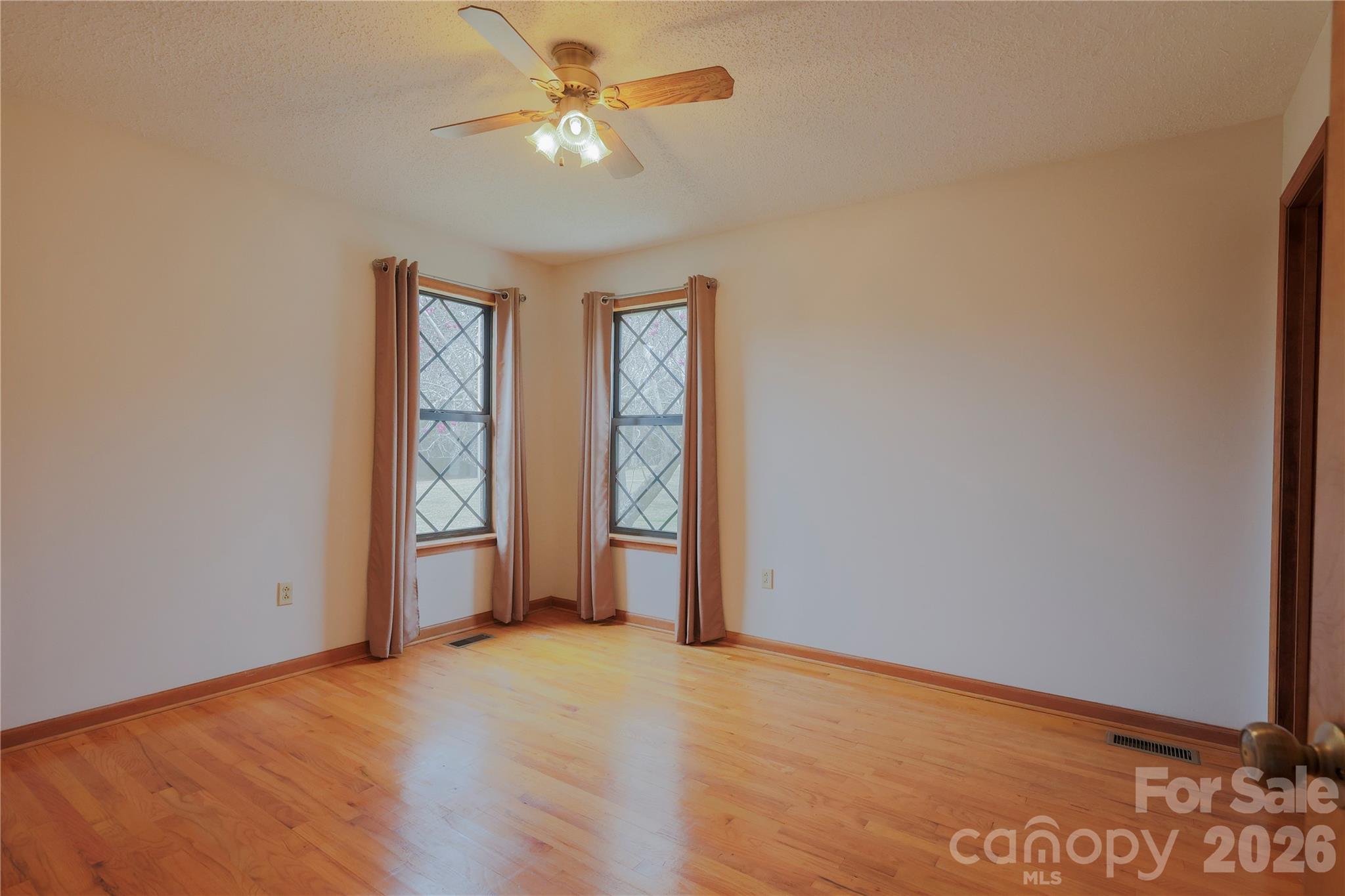 11237 Old Concord Road Rockwell, NC 28138 - Photo 15 of 30 an empty room with closet and a chandelier fan