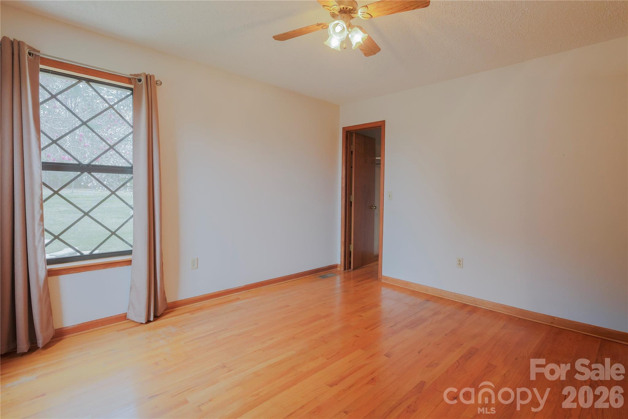 11237 Old Concord Road Rockwell, NC 28138 - Photo 17 of 30 an empty room with a view of wooden floor