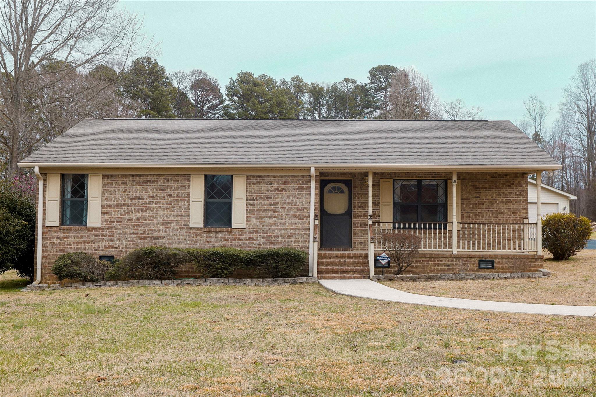 11237 Old Concord Road Rockwell, NC 28138 - Photo 2 of 30 a front view of a house with garden