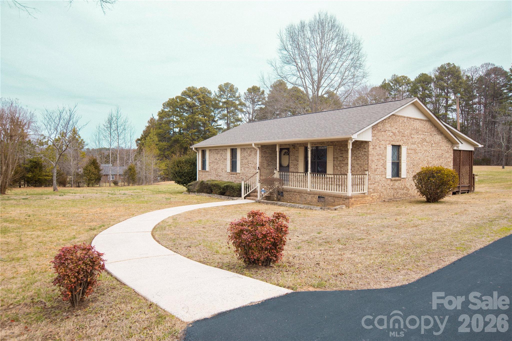 11237 Old Concord Road Rockwell, NC 28138 - Photo 3 of 30 a view of house with yard and trees in the background