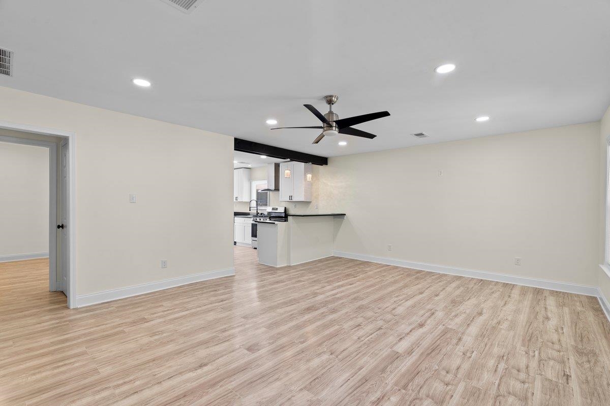 3607 Vanuys Road Memphis, TN 38111 - Photo 12 of 26 a view of a kitchen with a sink and wooden floor