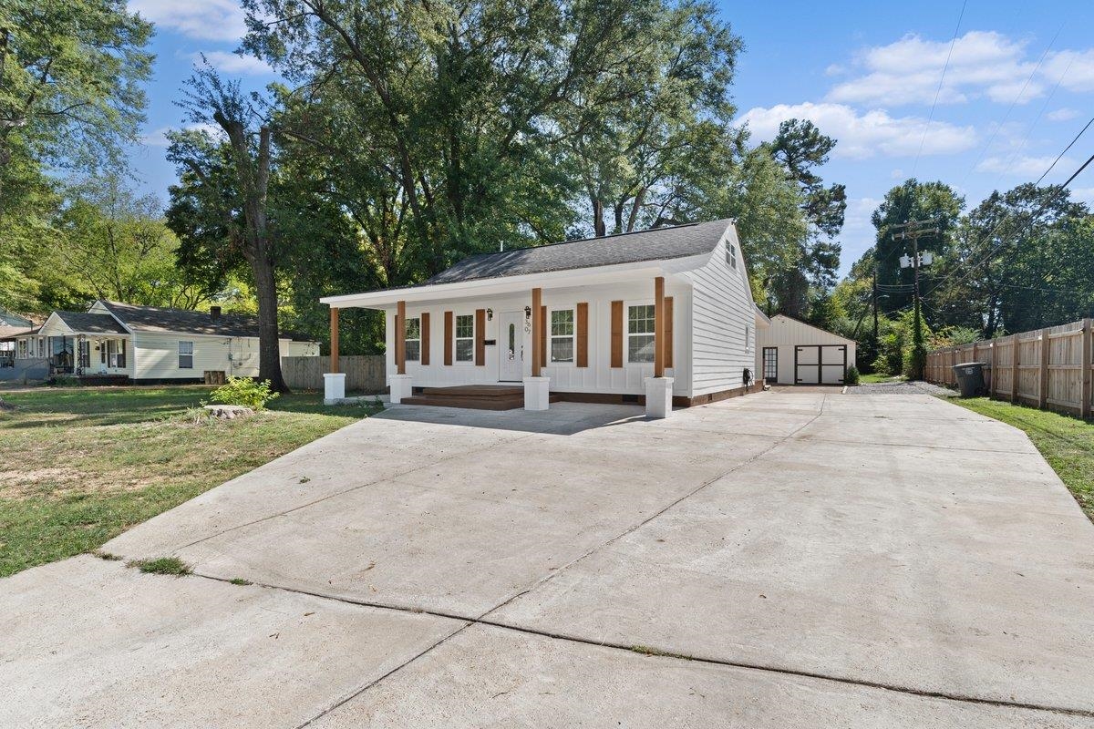 3607 Vanuys Road Memphis, TN 38111 - Photo 3 of 26 front view of a house with a yard