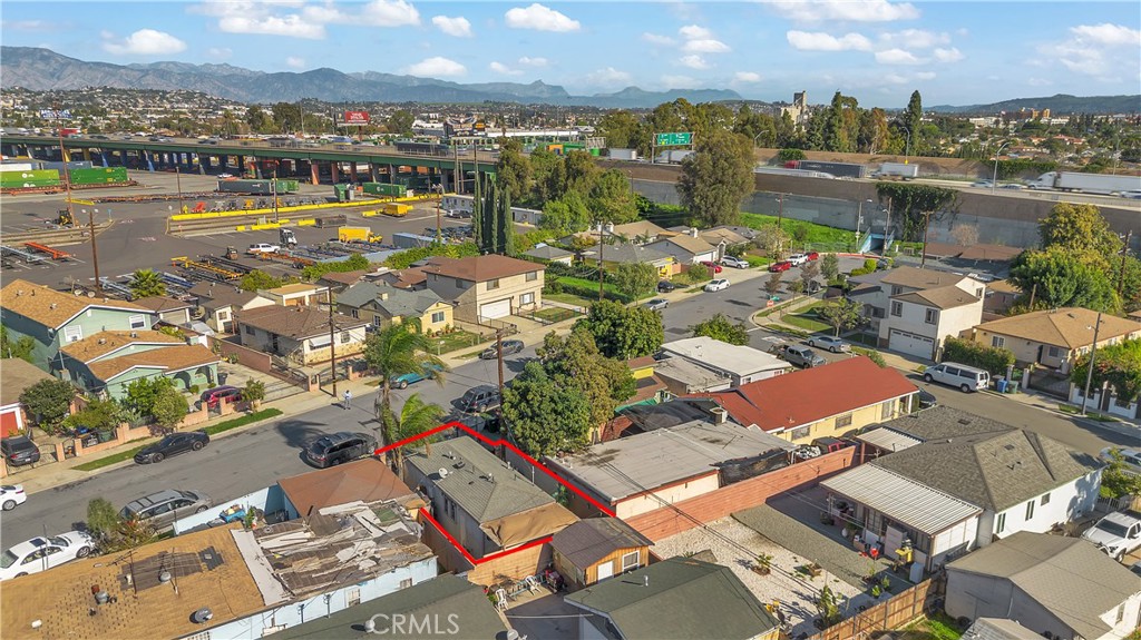 4610 Leonis Street Commerce, CA 90040 - Photo 30 of 32 an aerial view of residential houses with outdoor space and river