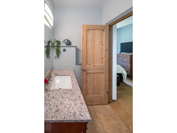 a view of living room with a baby crib