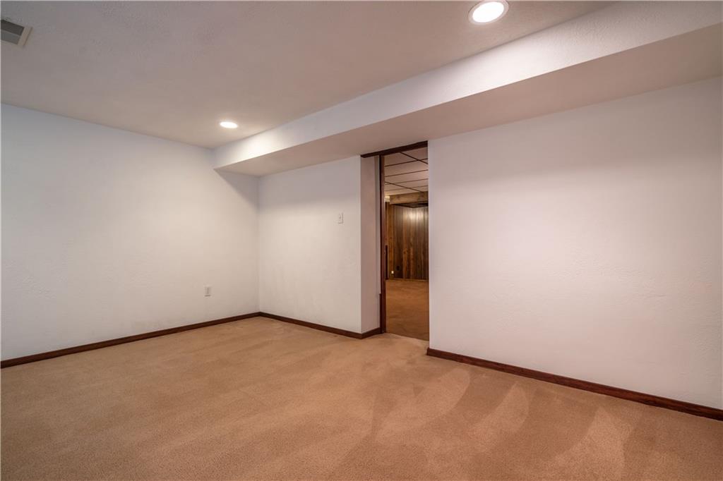 115 Center Church Road Canonsburg, PA 15317 - Photo 21 of 25 Lower level bedroom: features spacious closet and recessed lighting. This lovely room is beneath the family room addition and can access the first floor at a corner staircase.