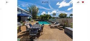 1410 Northeast 56th Court, Unit 1410 Fort Lauderdale, FL 33334 - Photo 6 of 14 a view of outdoor space yard and patio