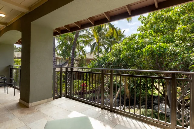 a view of balcony with furniture