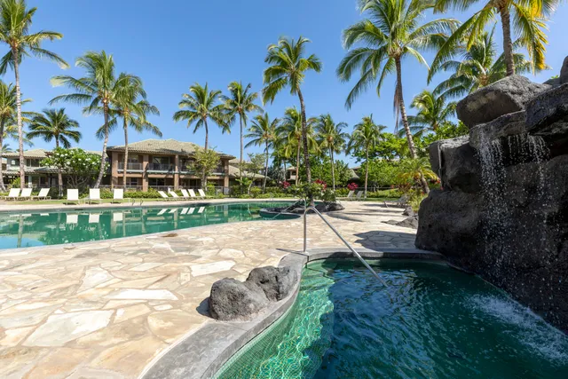 a view of a yard and front view of a house