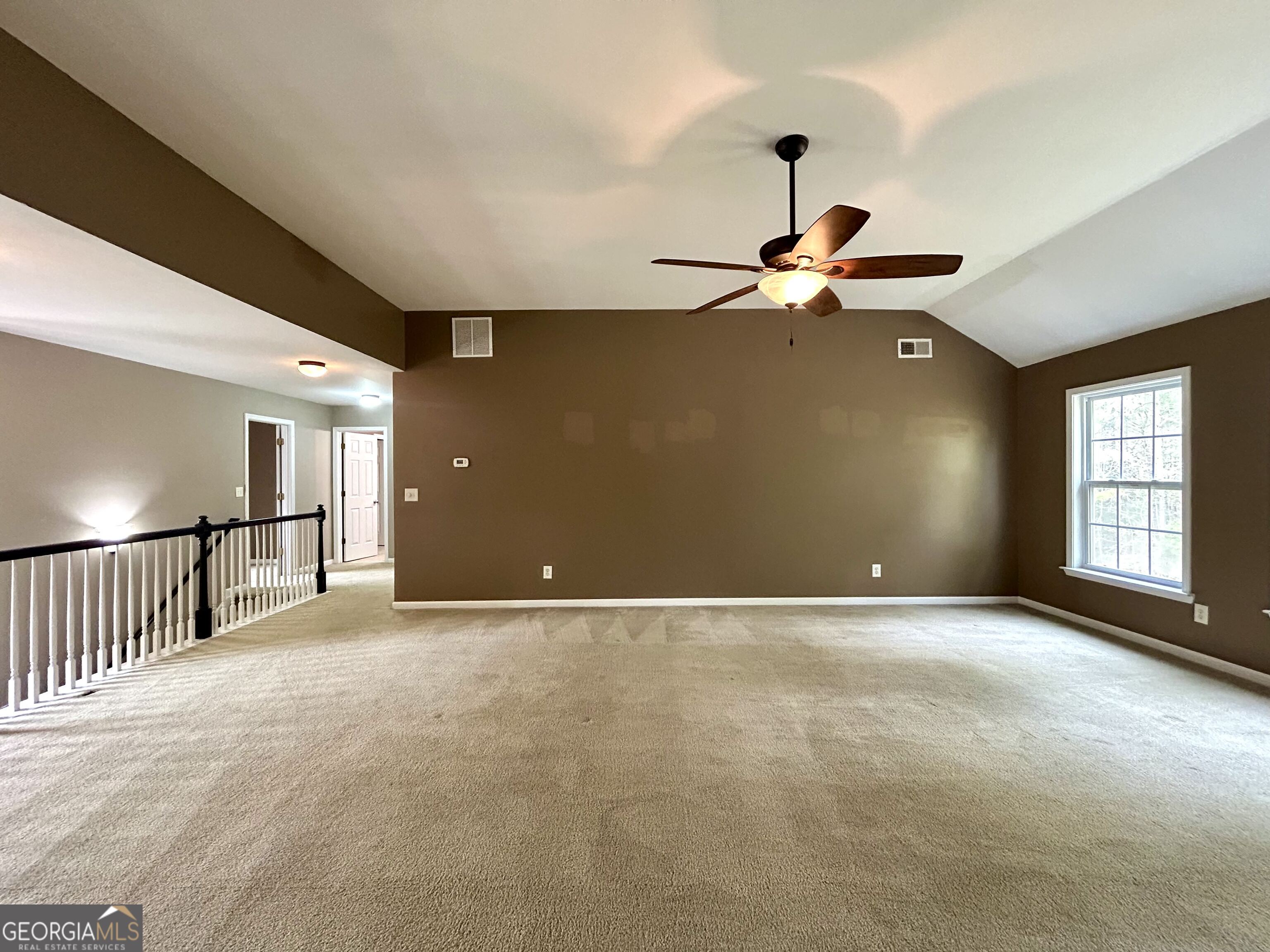 7613 Cedar Grove Court Fairburn, GA 30213 - Photo 12 of 61 a view of an empty room with a window
