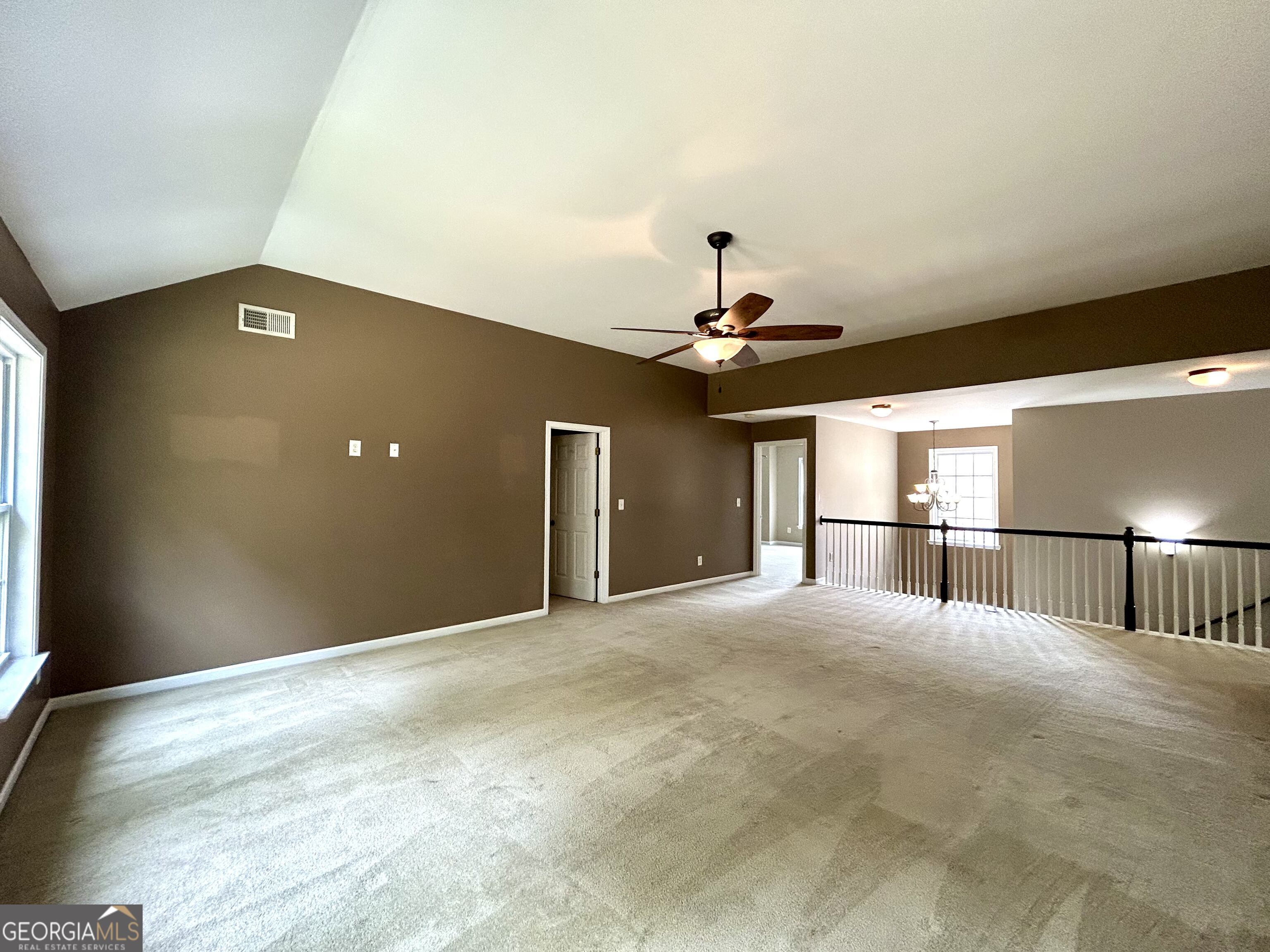 7613 Cedar Grove Court Fairburn, GA 30213 - Photo 13 of 61 a view of a livingroom with a ceiling fan and window