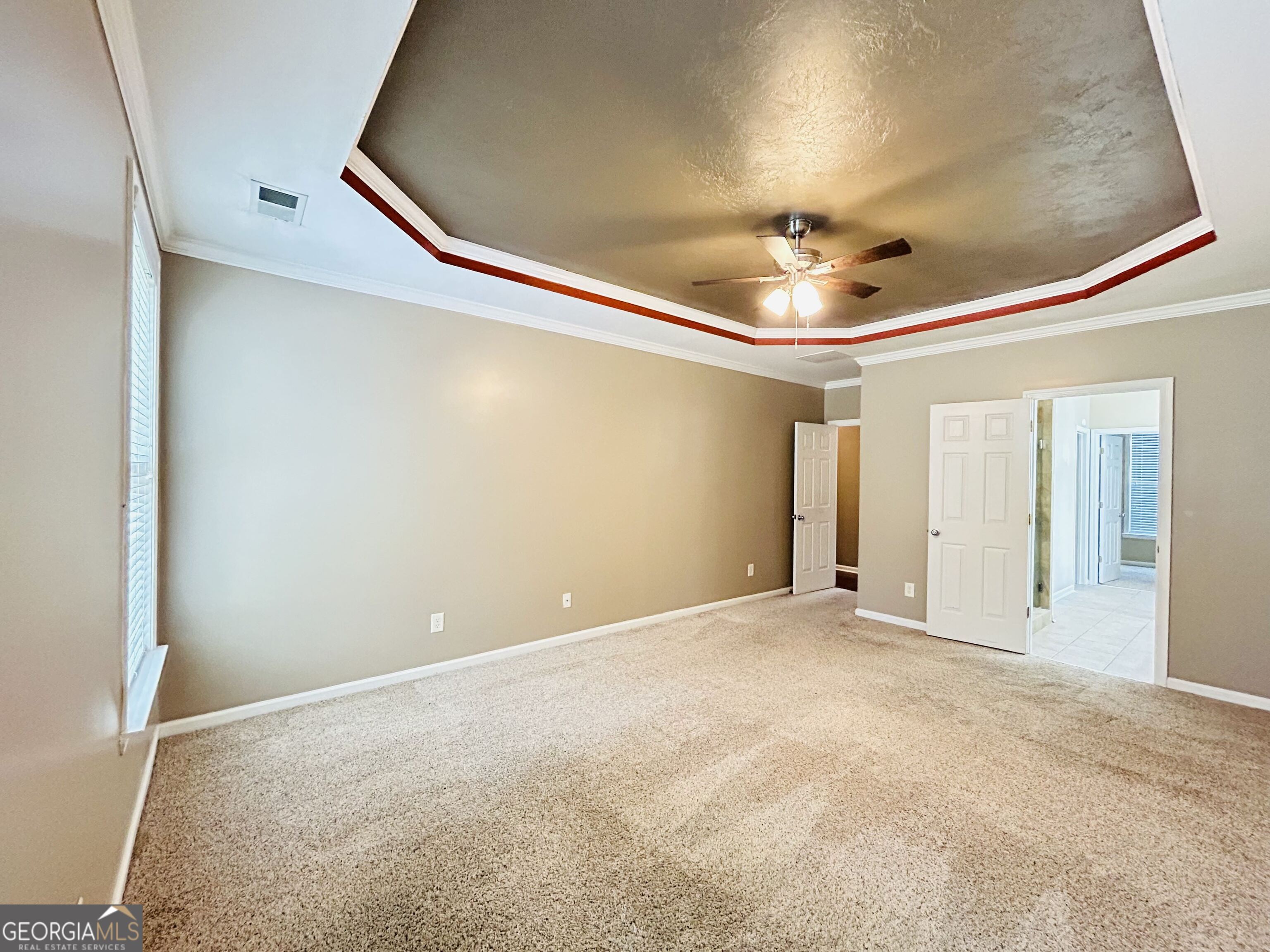 7613 Cedar Grove Court Fairburn, GA 30213 - Photo 33 of 61 a view of an empty room with a window