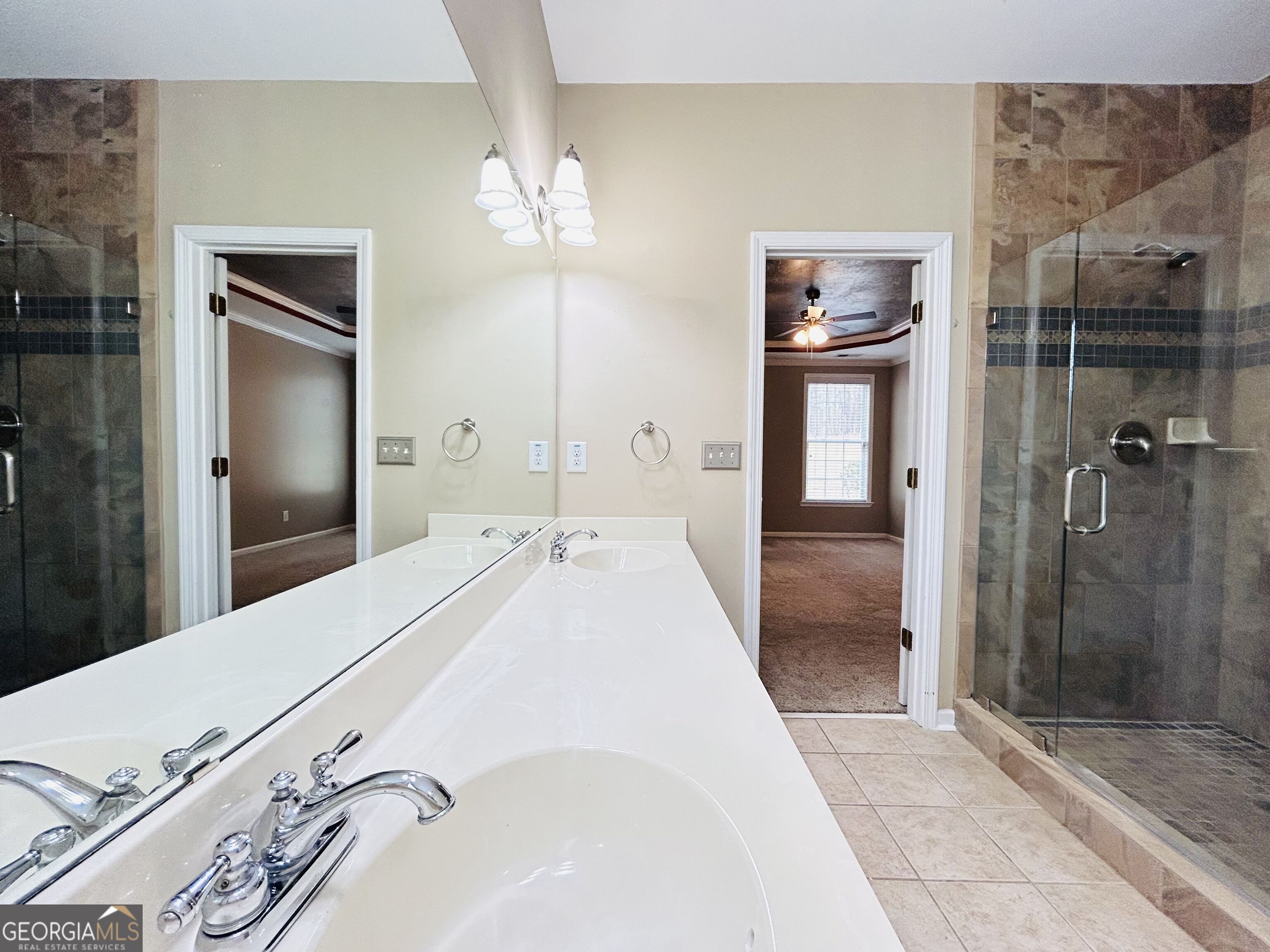 7613 Cedar Grove Court Fairburn, GA 30213 - Photo 37 of 61 a spacious bathroom with a shower and a sink