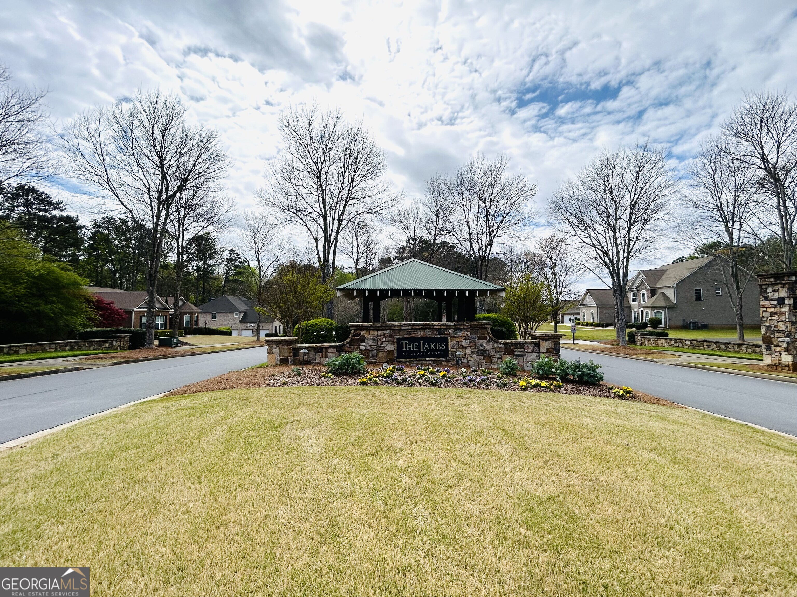 7613 Cedar Grove Court Fairburn, GA 30213 - Photo 4 of 61 a view of swimming pool with outdoor seating and trees in the background