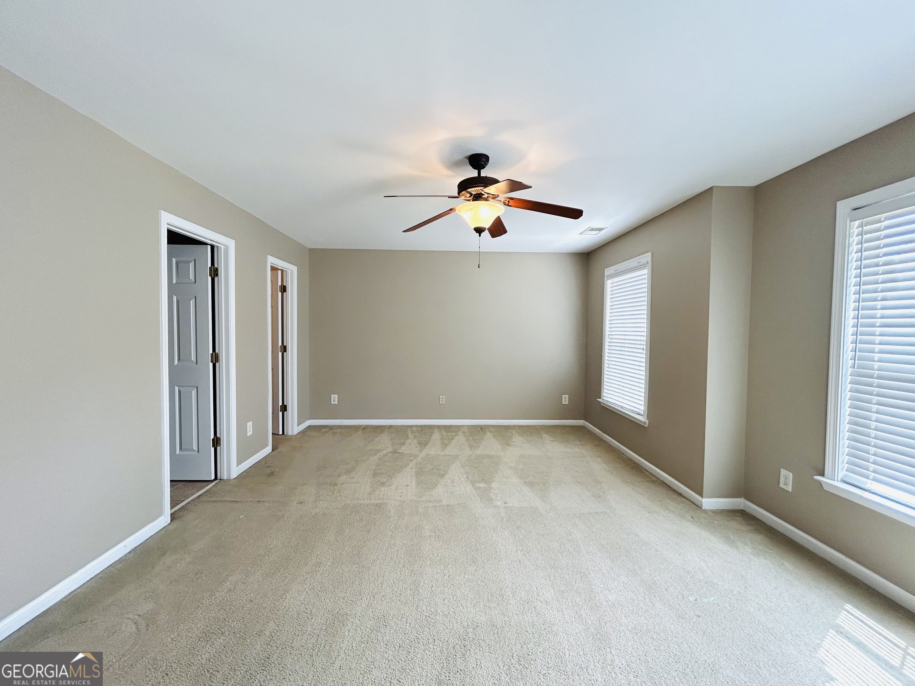 7613 Cedar Grove Court Fairburn, GA 30213 - Photo 42 of 61 a view of an empty room with a window