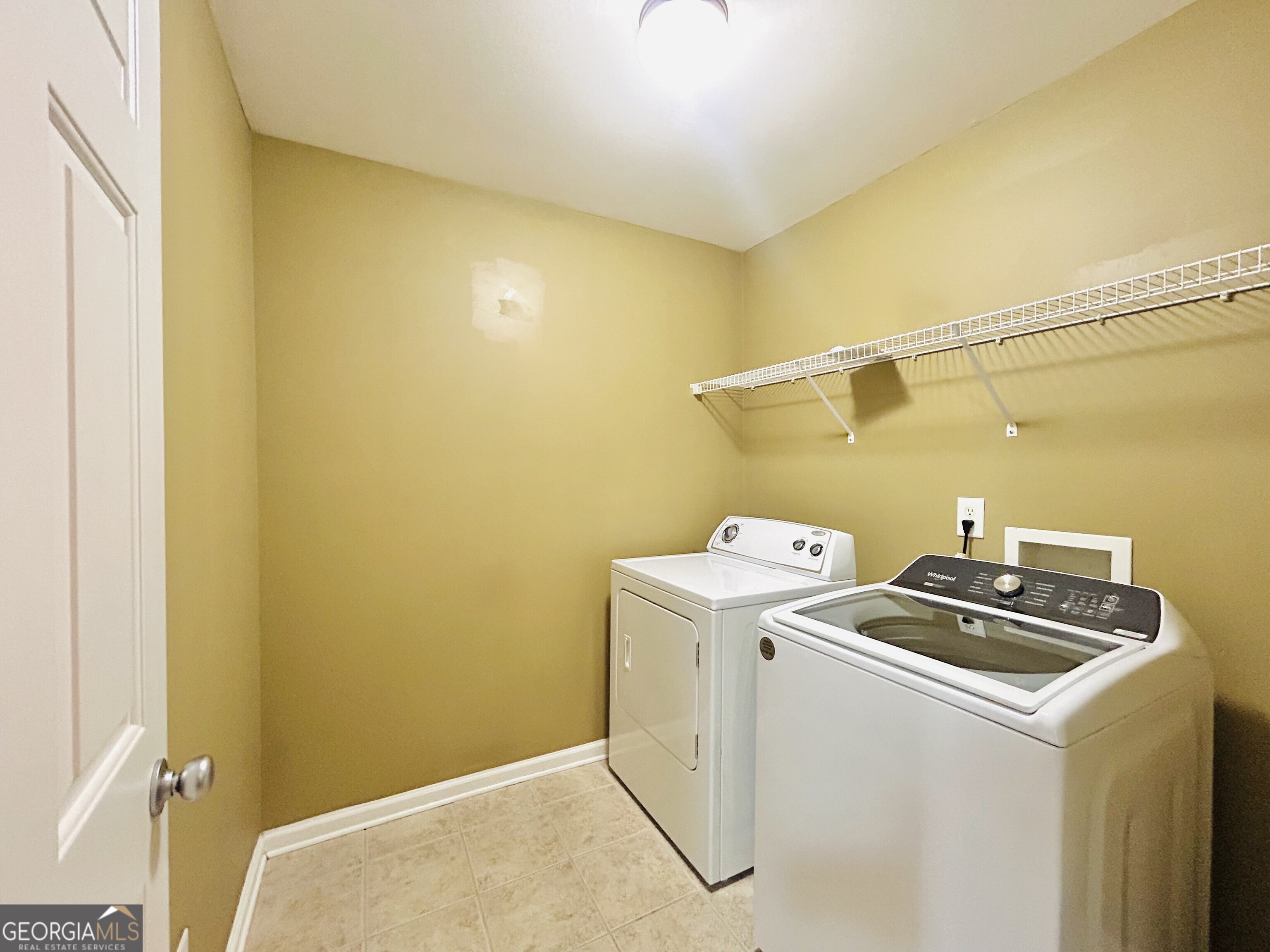 7613 Cedar Grove Court Fairburn, GA 30213 - Photo 54 of 61 a utility room with dryer and washer