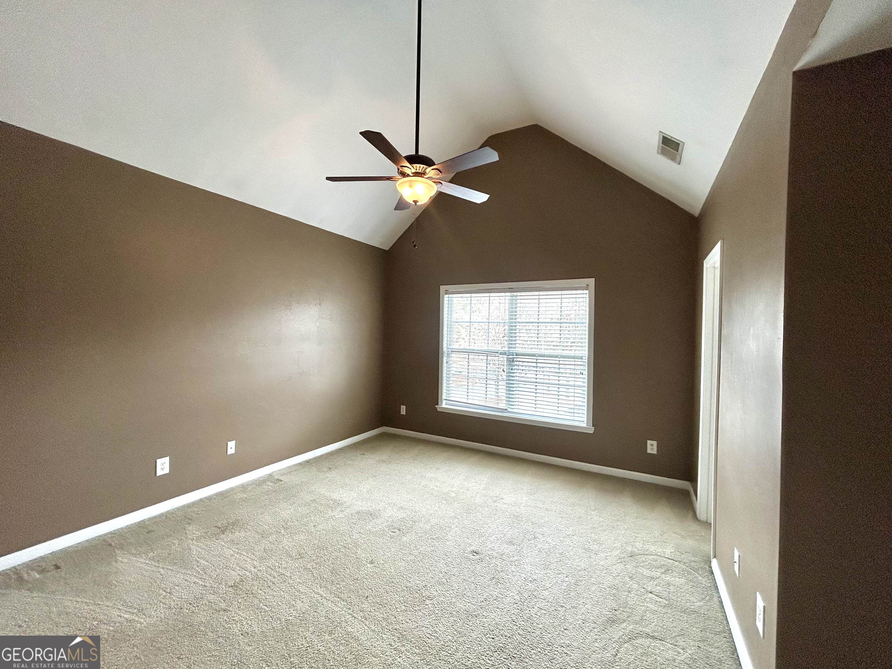 7613 Cedar Grove Court Fairburn, GA 30213 - Photo 56 of 61 a view of an empty room with a window