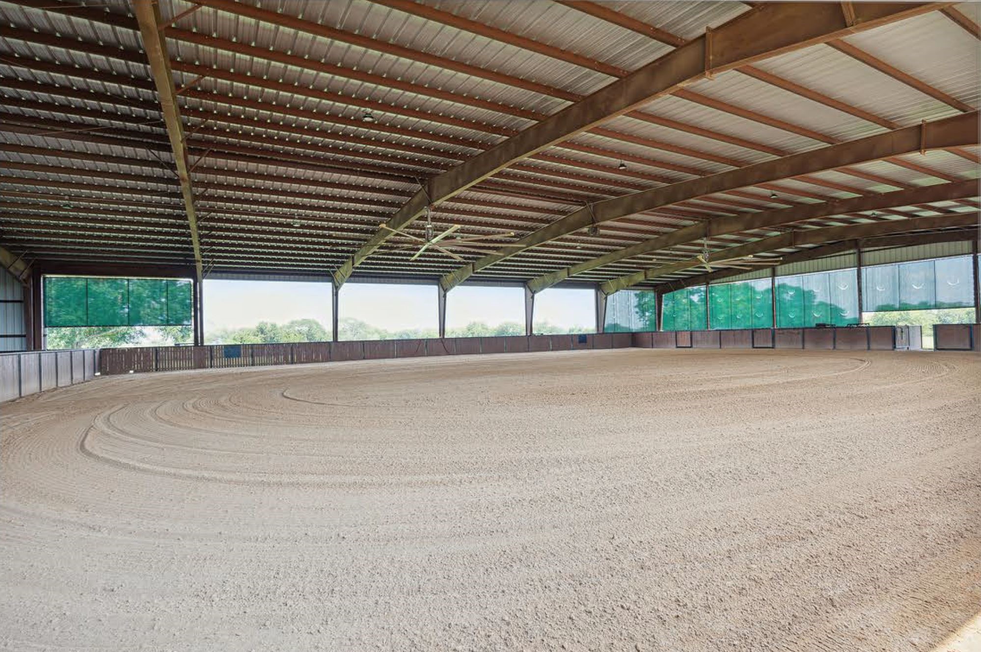 1325 Stalmach Road New Ulm, TX 78950 - Photo 18 of 50 Indoor arena 125'x105'. 8 stalls/catch pens 12'x20'. 3-wall sprinkler.