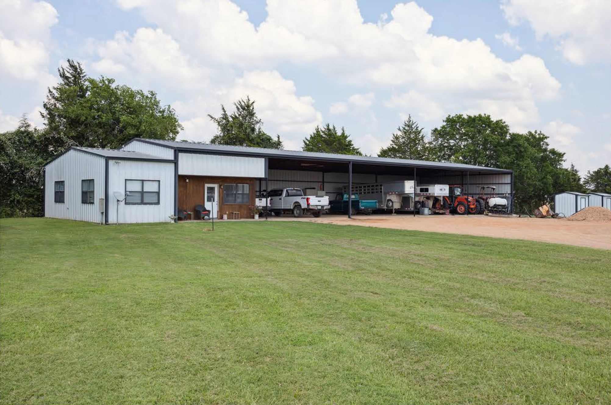 1325 Stalmach Road New Ulm, TX 78950 - Photo 26 of 50 Equipment barn with attached ranch manager's apartment.
