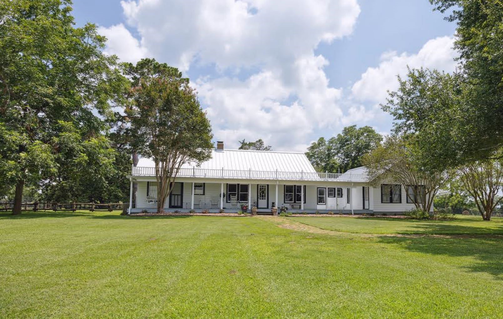 1325 Stalmach Road New Ulm, TX 78950 - Photo 29 of 50 Sprawling front lawn shaded by tall, beautiful trees.