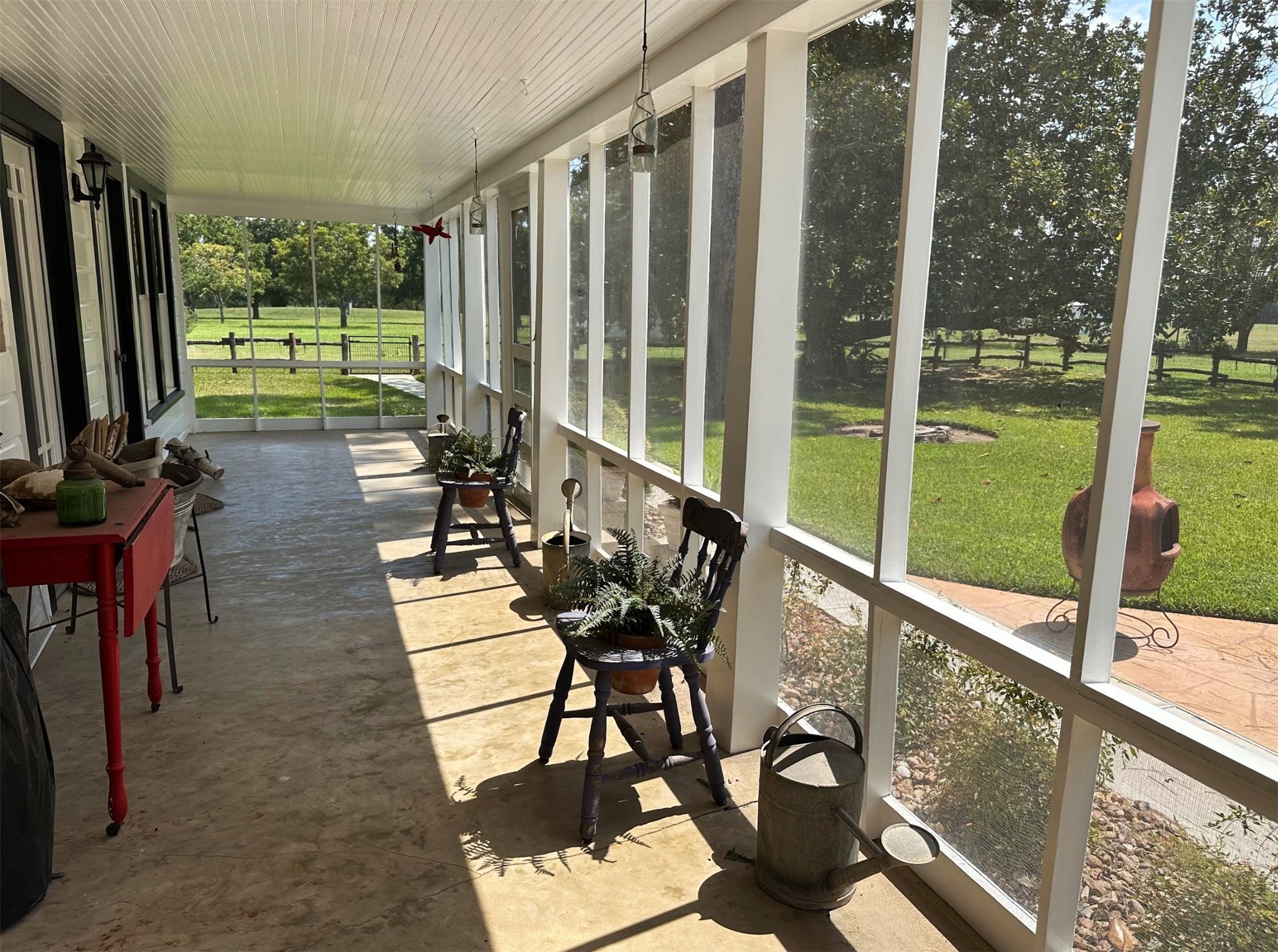 1325 Stalmach Road New Ulm, TX 78950 - Photo 34 of 50 Beautiful screened-in back porch looking out on the backyard.