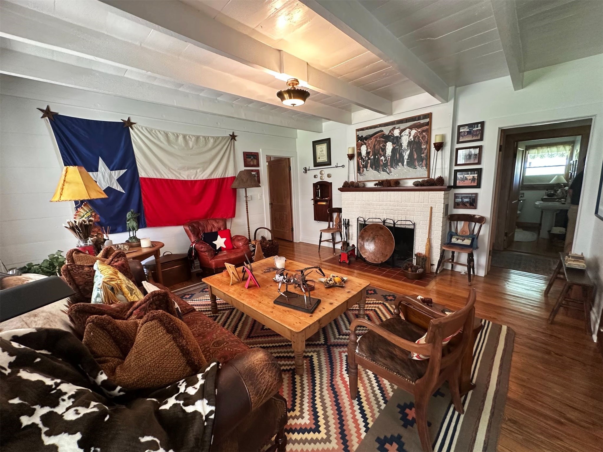 1325 Stalmach Road New Ulm, TX 78950 - Photo 39 of 50 Original family room with fireplace, shiplap walls and native walnut beams overhead.