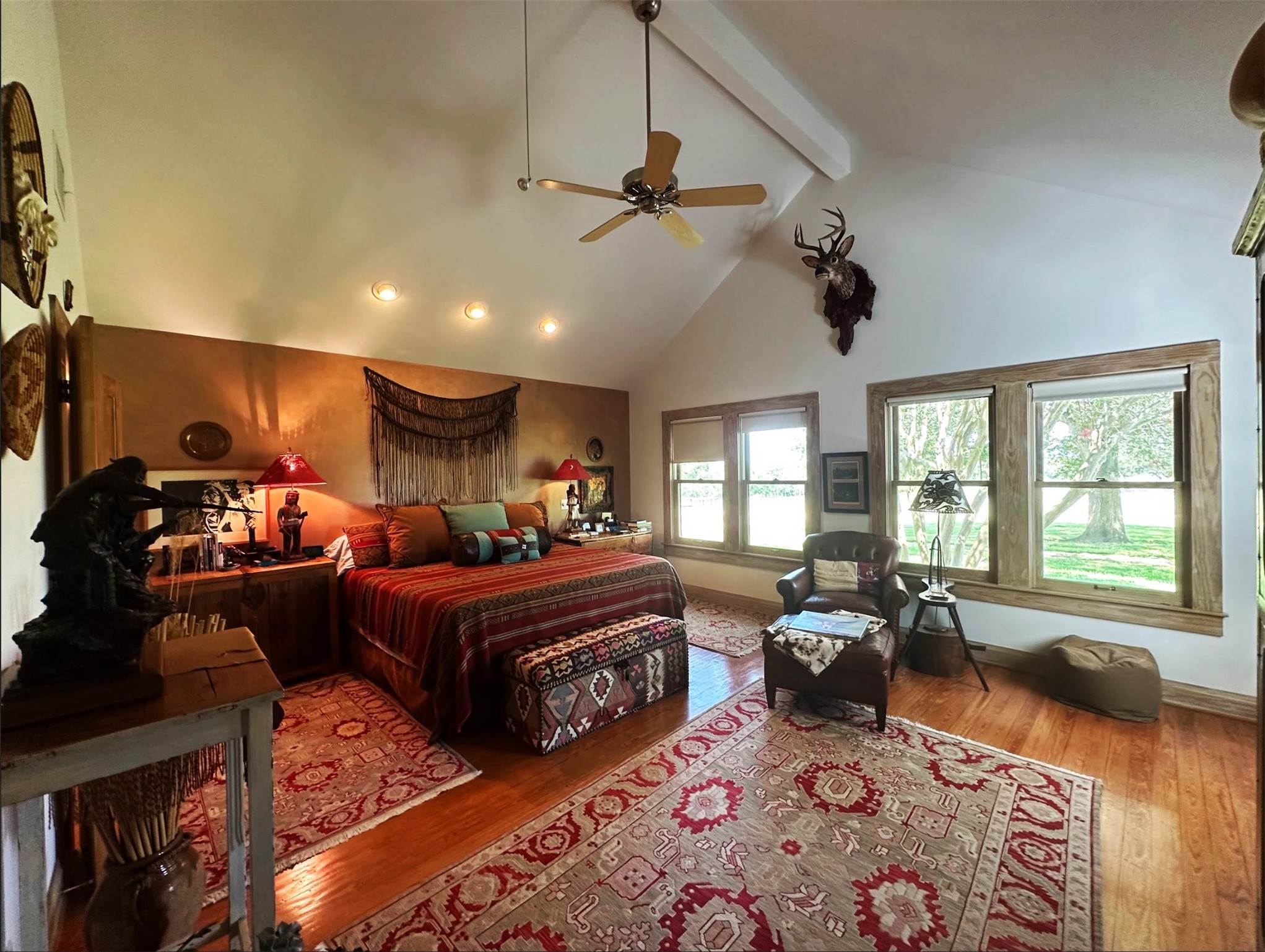 1325 Stalmach Road New Ulm, TX 78950 - Photo 46 of 50 Master suite with private access to front porch; vaulted ceilings and wood-framed windows.