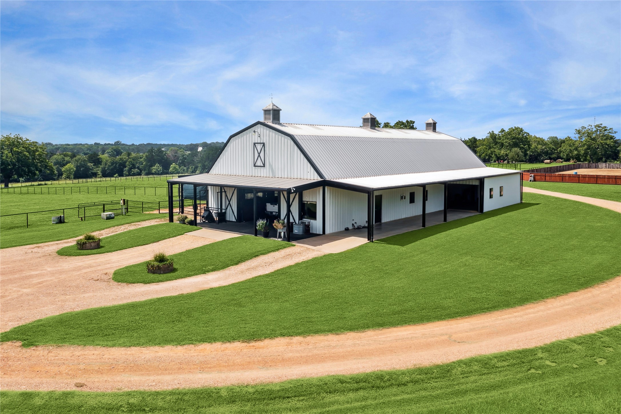 1325 Stalmach Road New Ulm, TX 78950 - Photo 7 of 50 Horse barn and gravel drive.