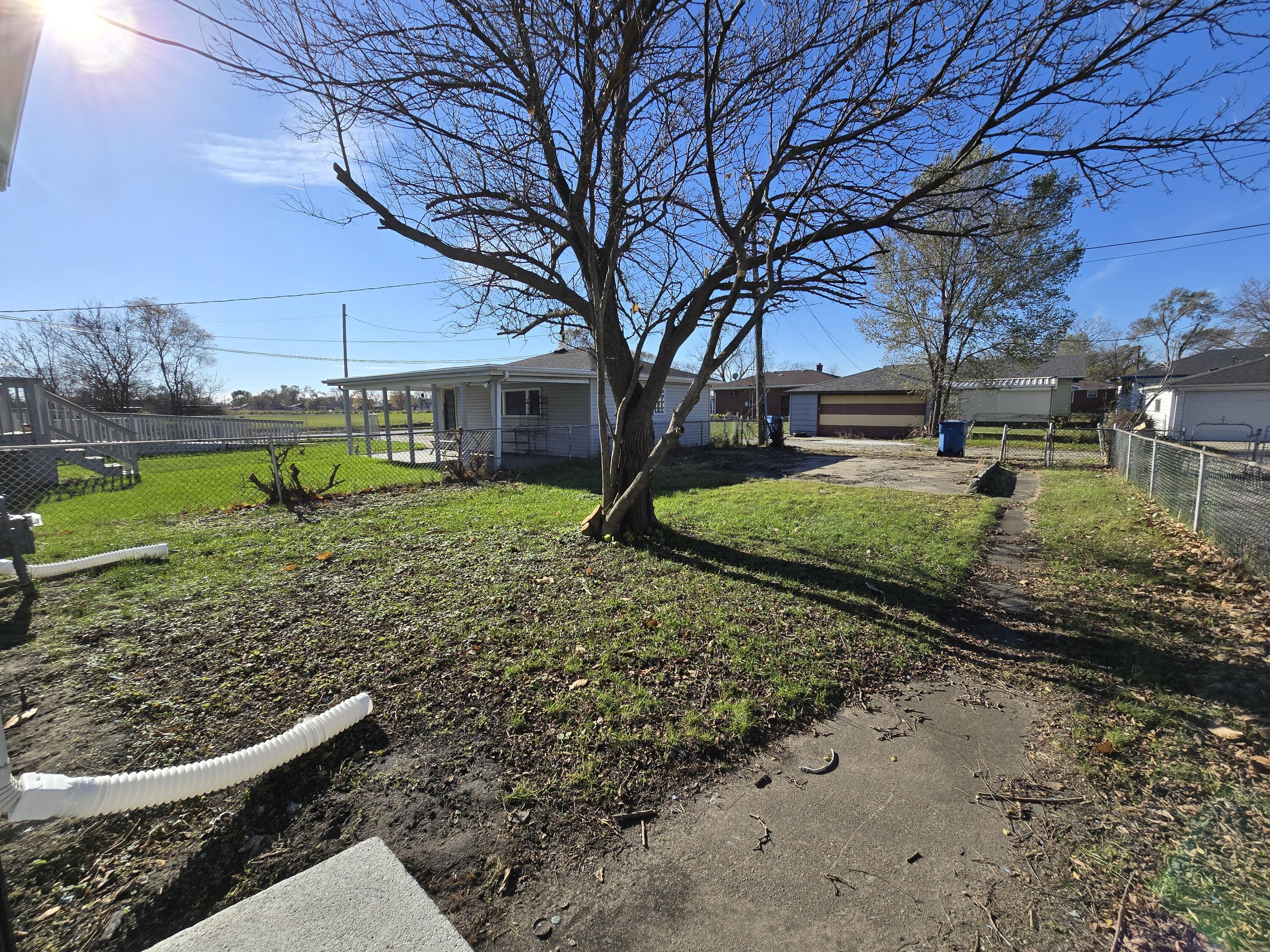 1622 Ohio Street Gary, IN 46407 - Photo 17 of 17 a view of a garden with a tree