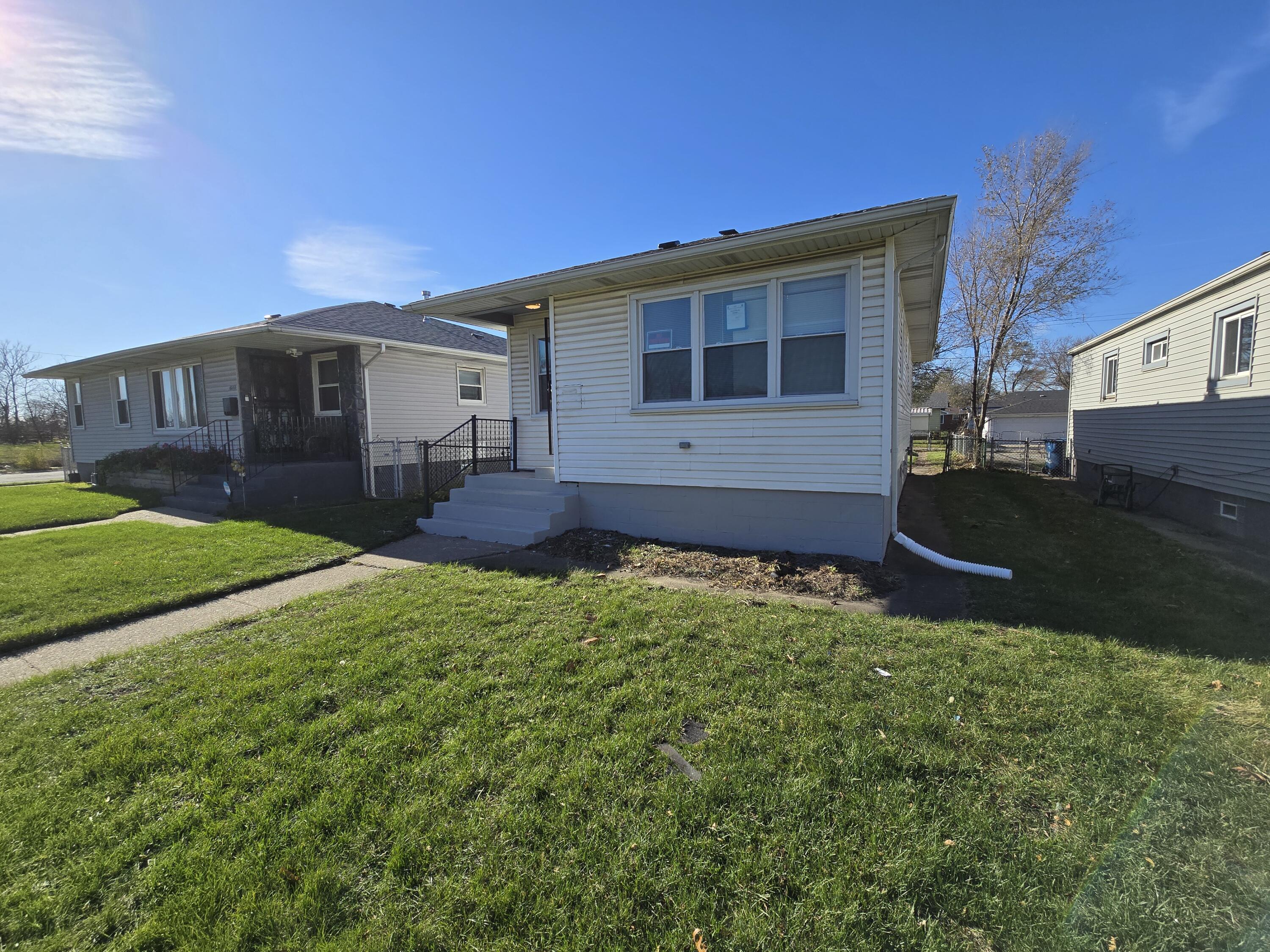 1622 Ohio Street Gary, IN 46407 - Photo 2 of 17 a backyard of a house