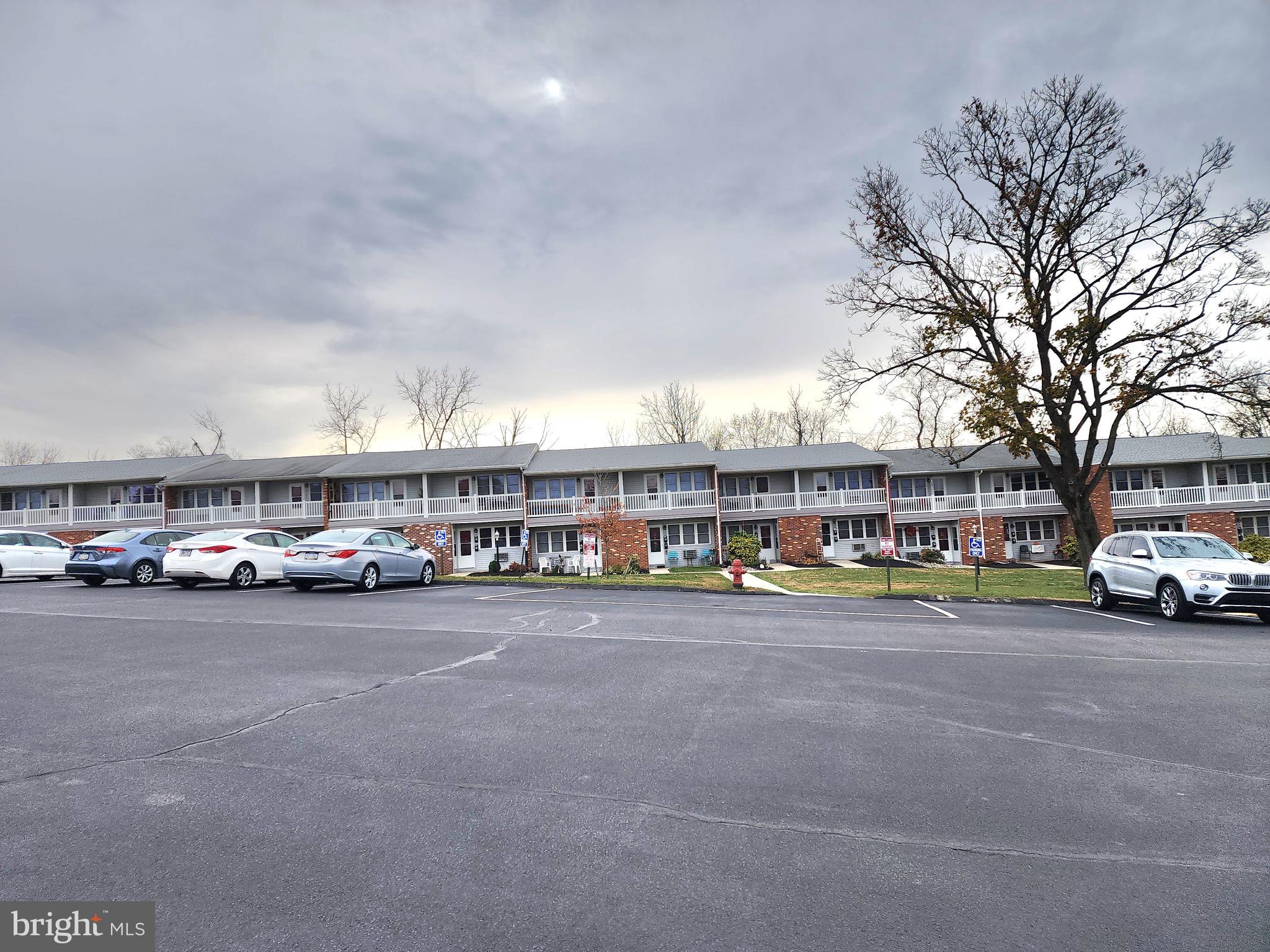 76 Lark Circle York, PA 17404 - Photo 14 of 28 a view of a cars parked in front of a building