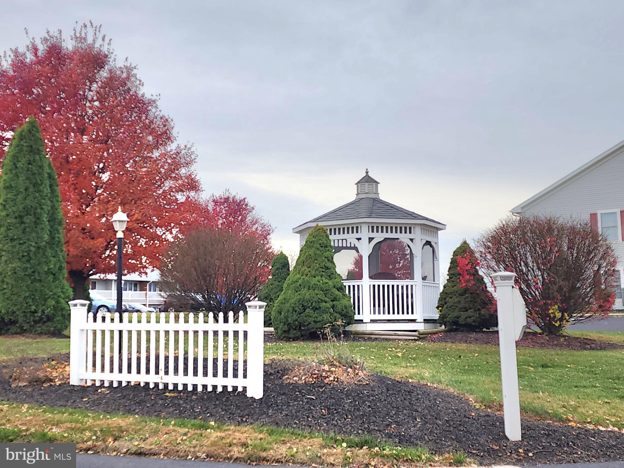 76 Lark Circle York, PA 17404 - Photo 20 of 28 a front view of a house with garden