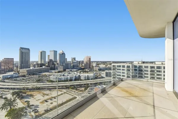 a view of a balcony with city view