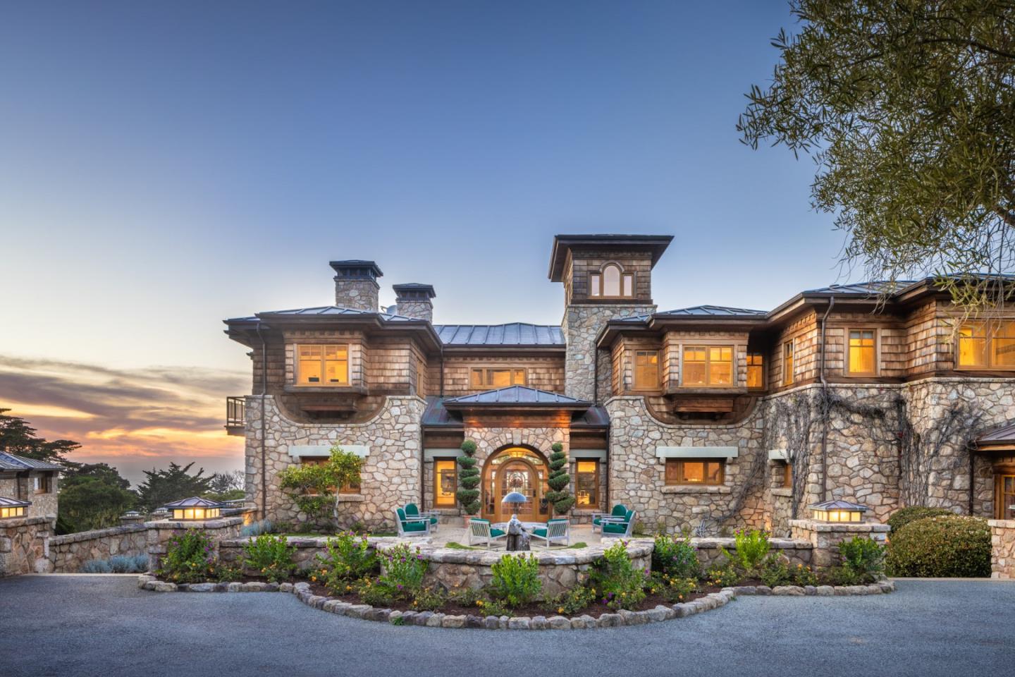 72 Fern Canyon Road Carmel, CA 93923 - Photo 4 of 66 a front view of a residential apartment building with a yard