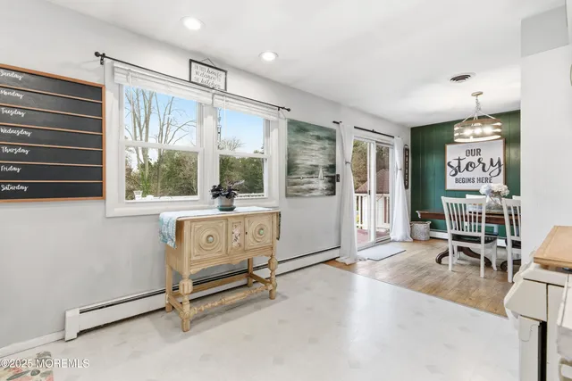 a room with lots of furniture and windows