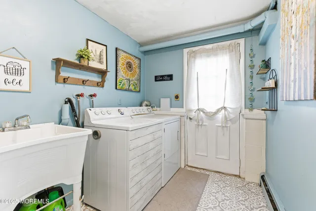 a room with dryer and washer