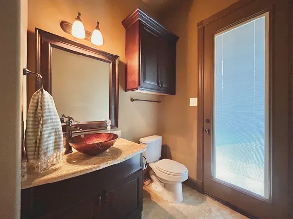 a large bathroom with double vanity sink and a mirror