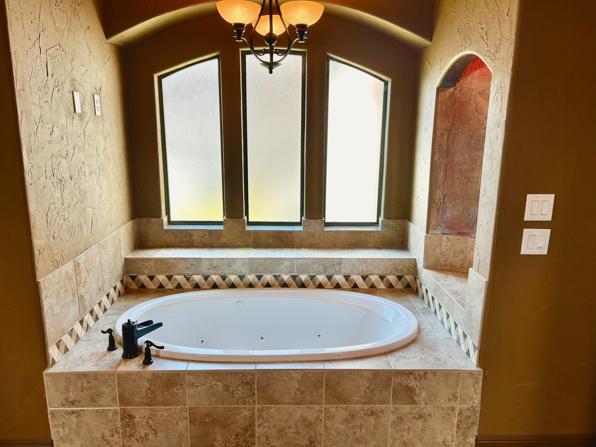 7511 Raes Creek Drive Spring, TX 77389 - Photo 23 of 41 a bath tub sitting in a bathroom next to a window