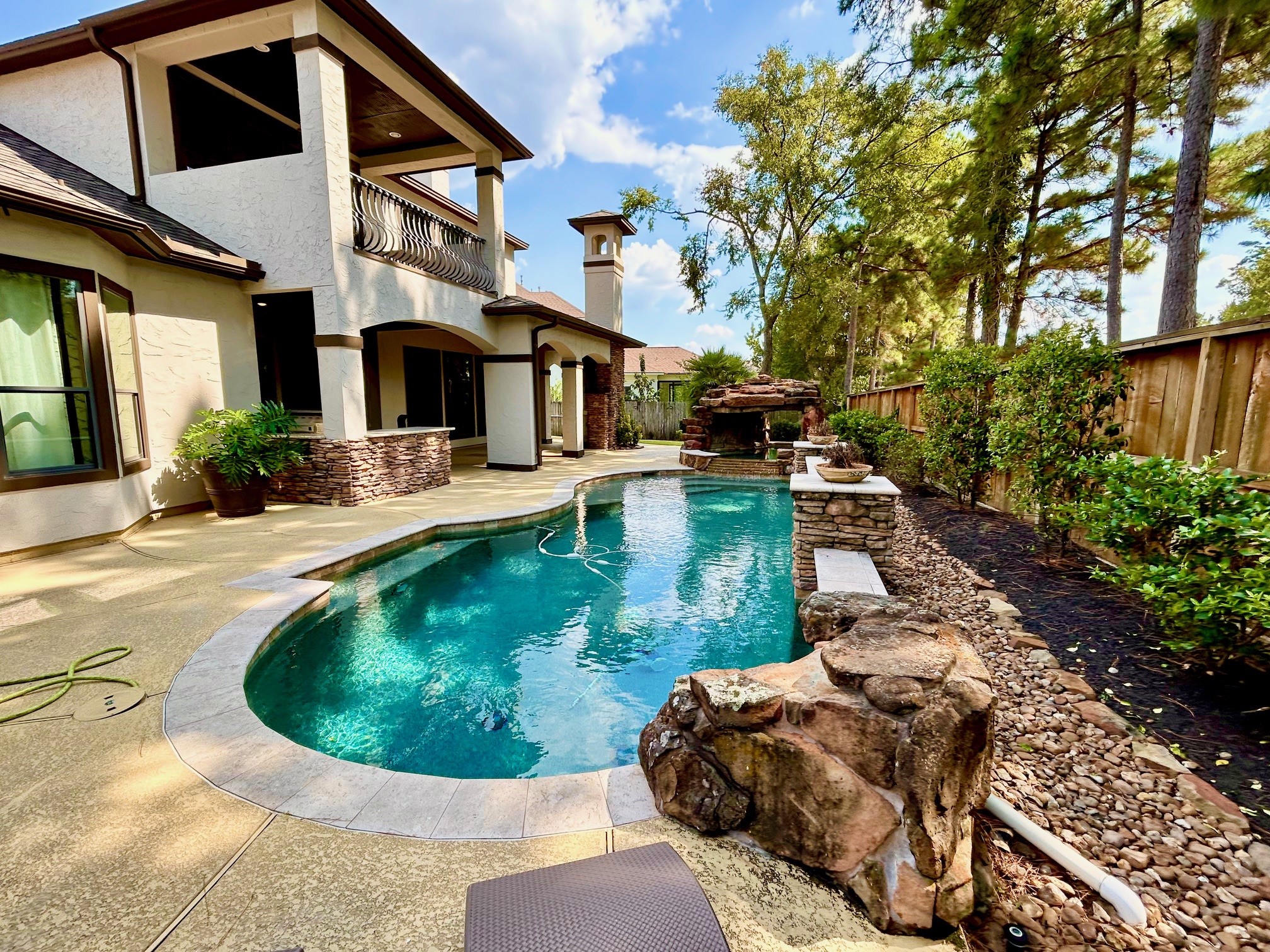 7511 Raes Creek Drive Spring, TX 77389 - Photo 26 of 41 a view of a house with backyard outdoor seating area