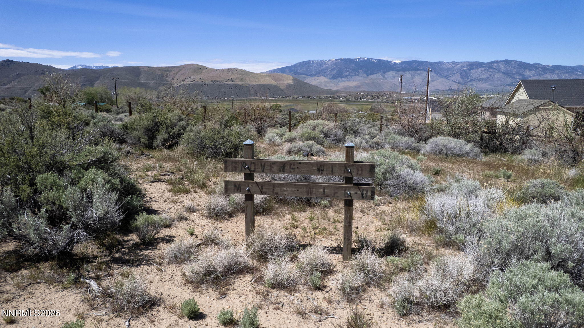 6260 Pursia Road Carson City, NV 89701 - Photo 12 of 26 a view of a town with mountains in the background