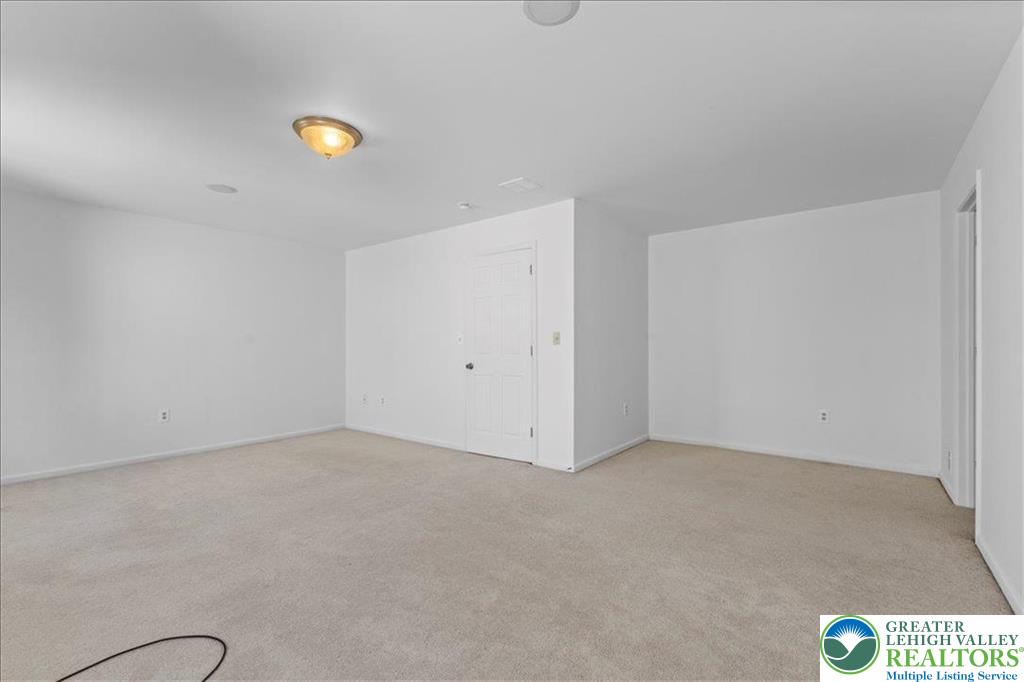 6832 Scenic View Drive Lower Macungie Township, PA 18062 - Photo 15 of 21 a view of an empty room