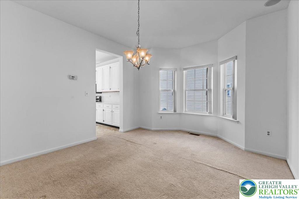 6832 Scenic View Drive Lower Macungie Township, PA 18062 - Photo 18 of 21 a view of an empty room with a window