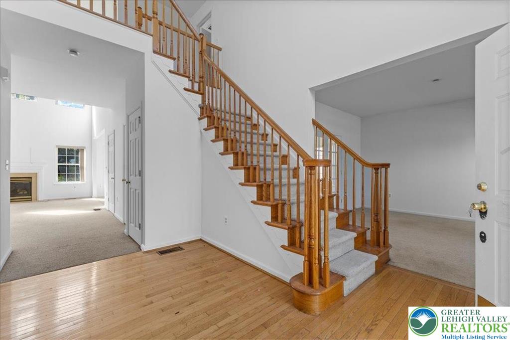 6832 Scenic View Drive Lower Macungie Township, PA 18062 - Photo 2 of 21 a view of entryway and hall with wooden floor