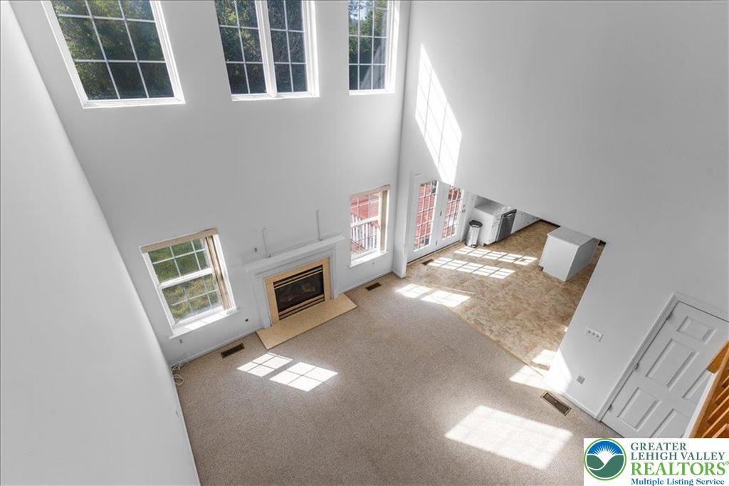6832 Scenic View Drive Lower Macungie Township, PA 18062 - Photo 5 of 21 a view of living room with furniture and fireplace