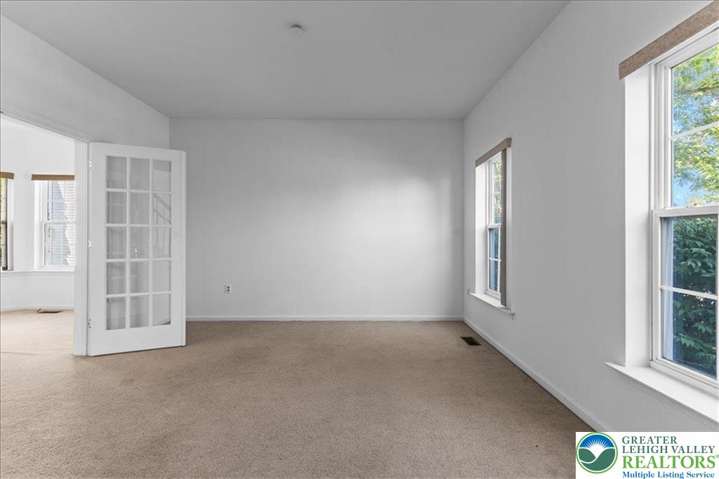 6832 Scenic View Drive Lower Macungie Township, PA 18062 - Photo 6 of 21 an empty room with windows