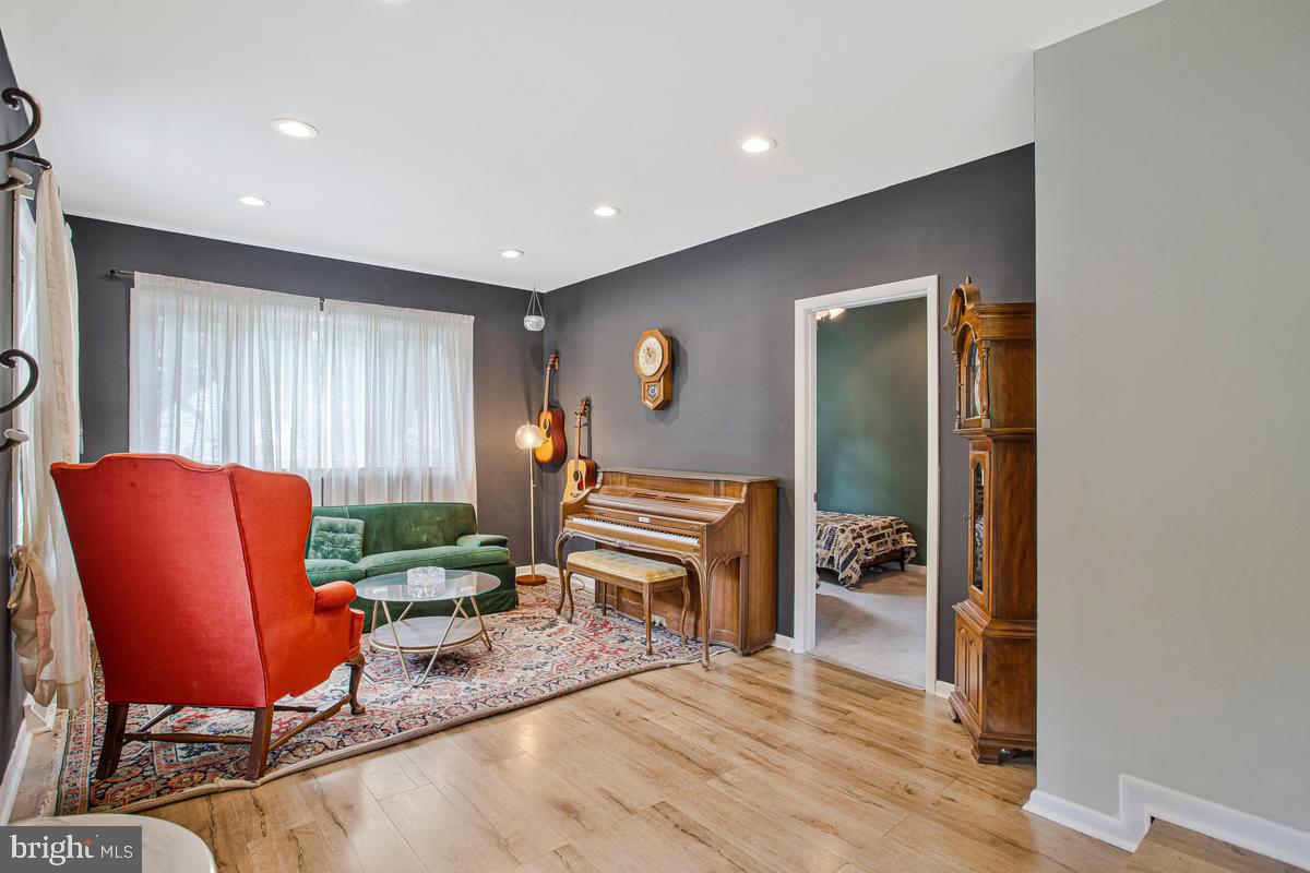 976 Shore Acres Road Arnold, MD 21012 - Photo 10 of 40 a living room with furniture and a wooden floor