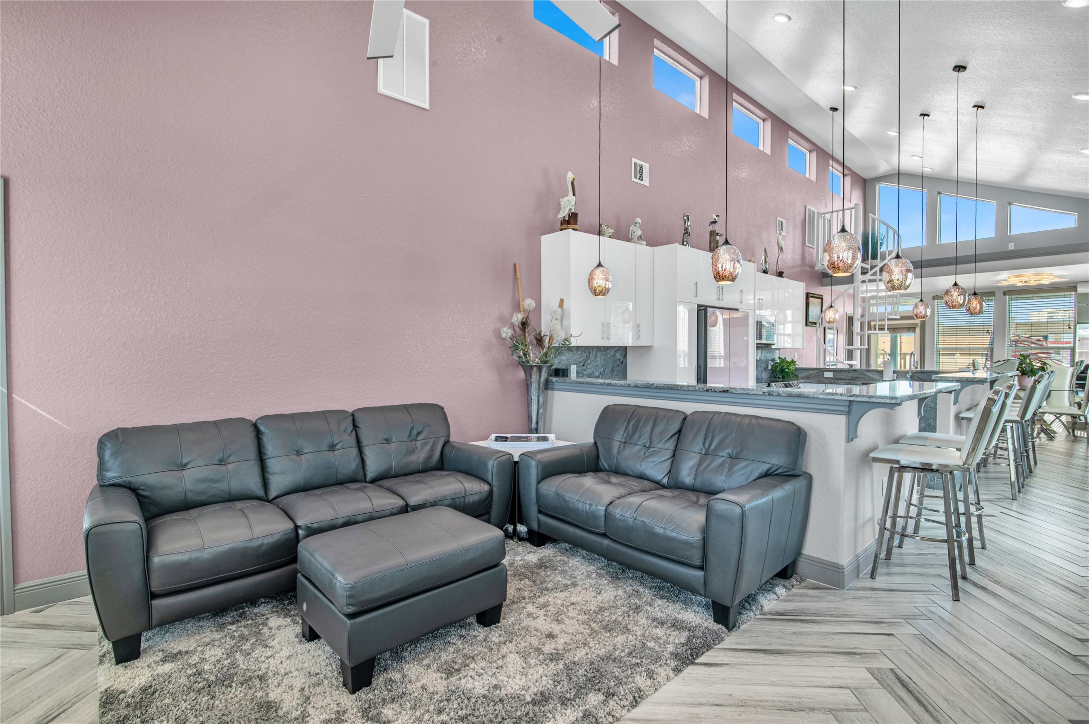 3709 Rice Street Galveston, TX 77554 - Photo 15 of 46 a view of living room kitchen with furniture and wooden floor
