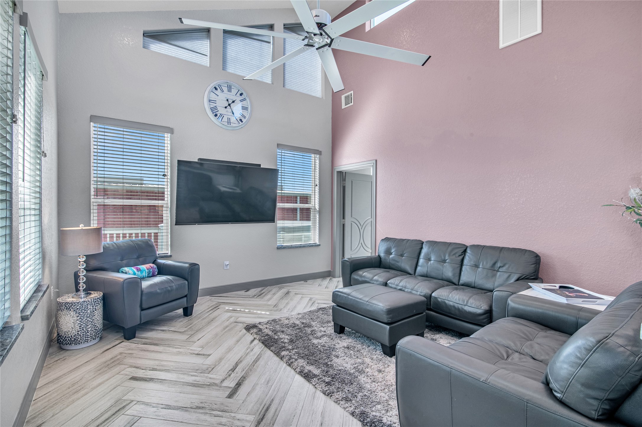 3709 Rice Street Galveston, TX 77554 - Photo 16 of 46 a living room with furniture and a flat screen tv