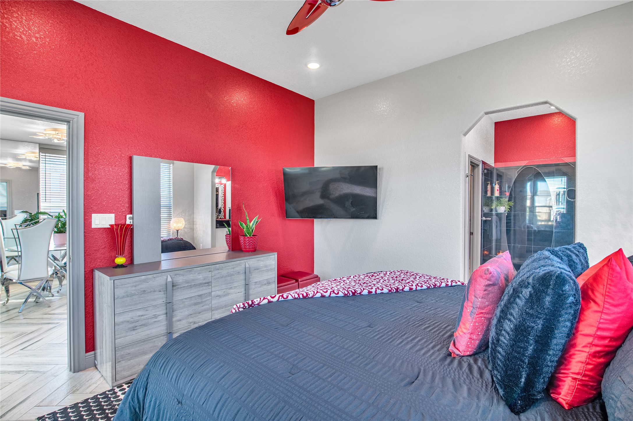 3709 Rice Street Galveston, TX 77554 - Photo 22 of 46 a bedroom with a bed and a mirror