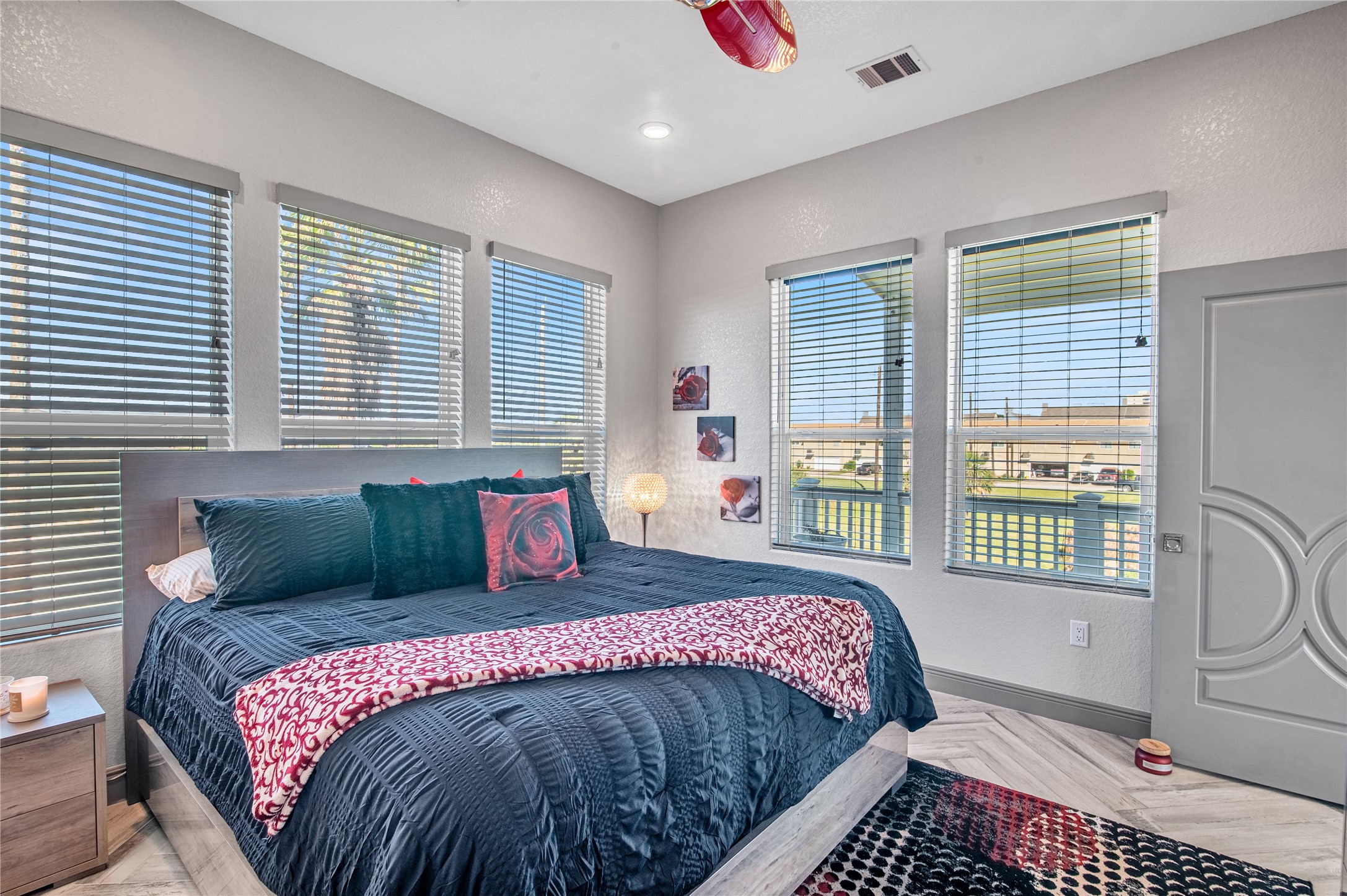 3709 Rice Street Galveston, TX 77554 - Photo 24 of 46 a bedroom with a large bed and a window